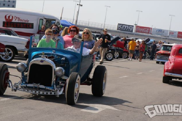 Family of five Riding in Blue Ford Hot Rod
