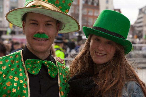 two people wearing green st. Patrick's day outfits