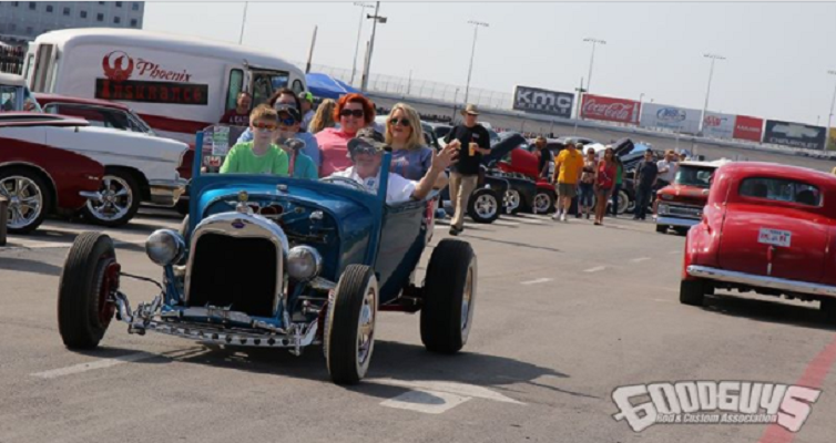 Family of five Riding in Blue Ford Hot Rod